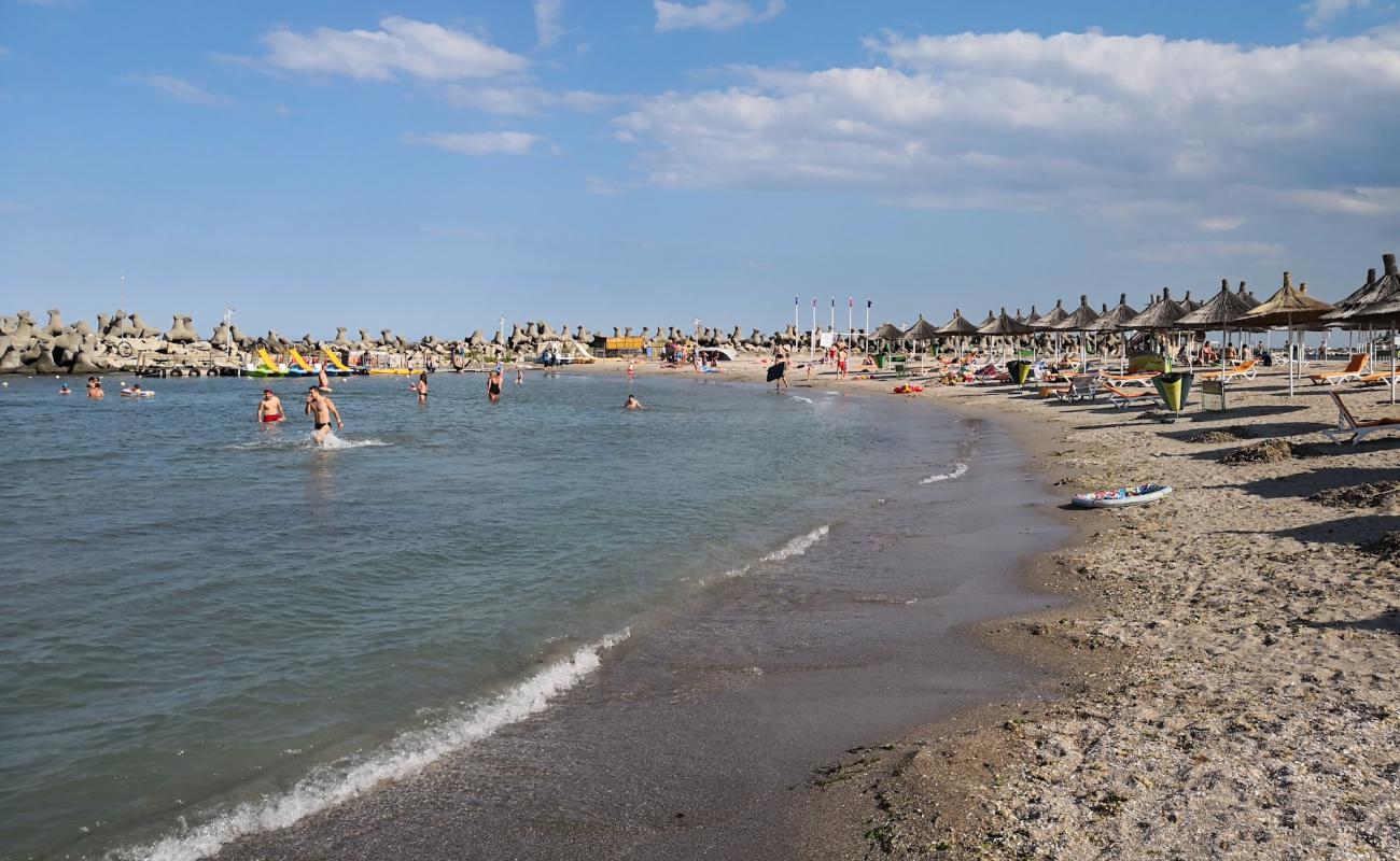 Photo of Saturn beach with bright sand surface