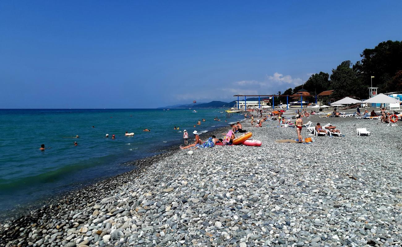 Photo of Loo beach with gray pebble surface