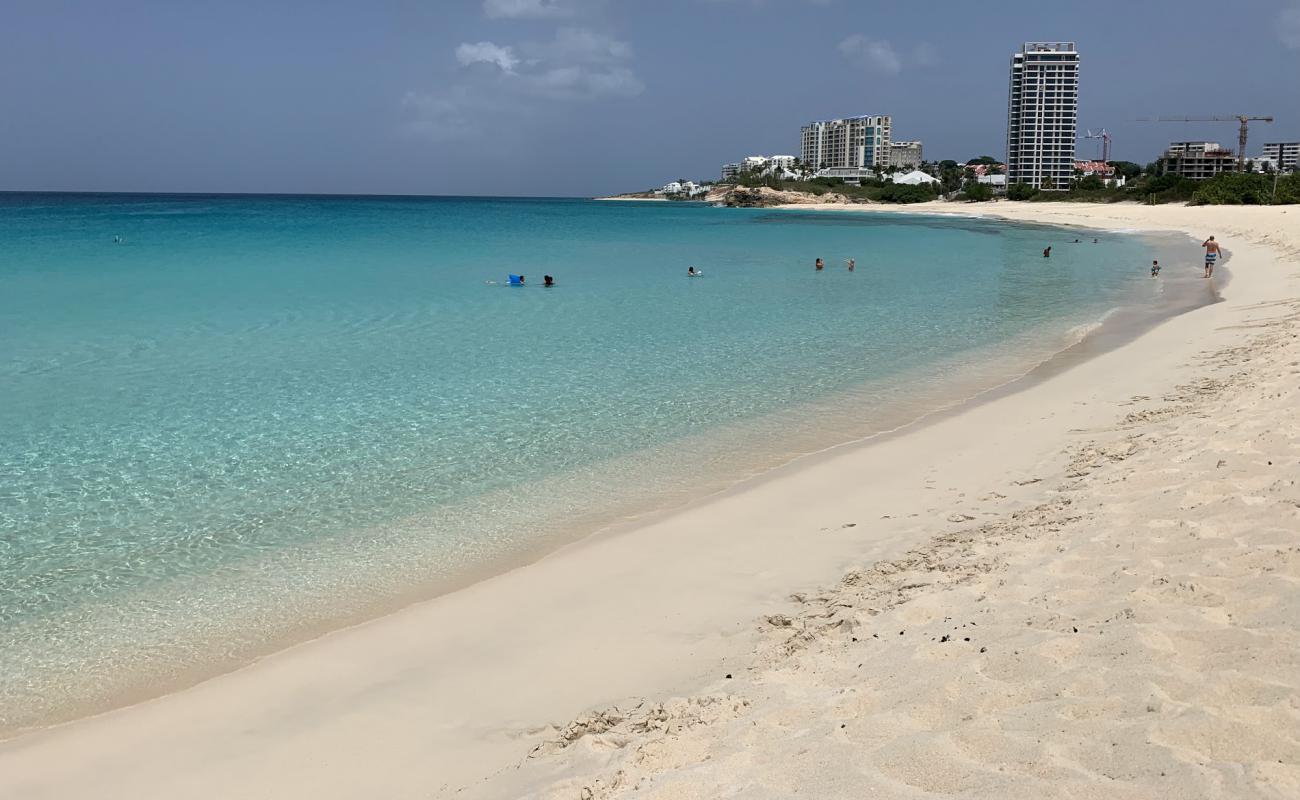 Photo of Mullet Bay beach with bright fine sand surface