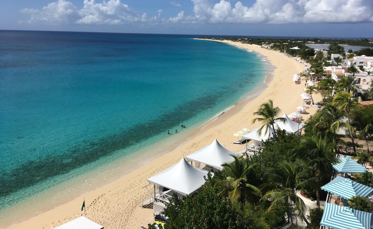 Photo of Long beach with bright fine sand surface