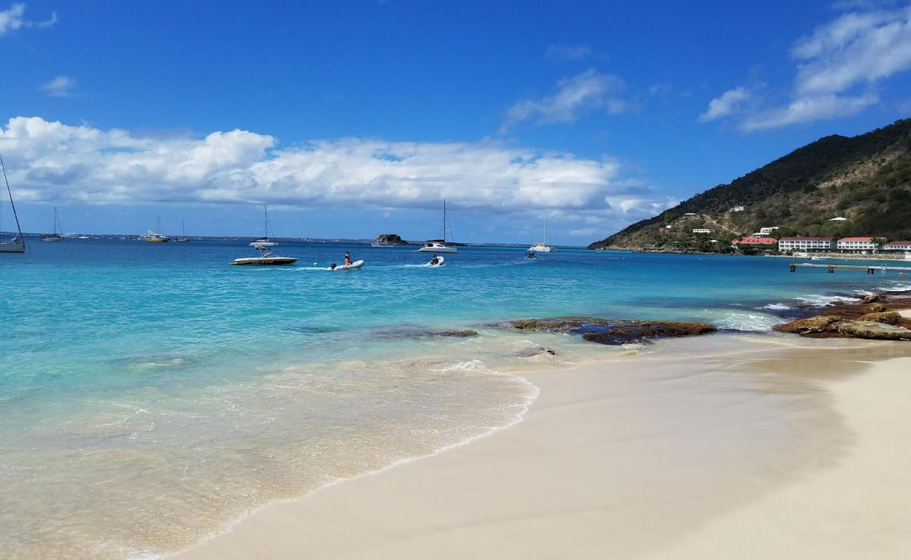 Photo of Plum Bay beach with bright sand & rocks surface