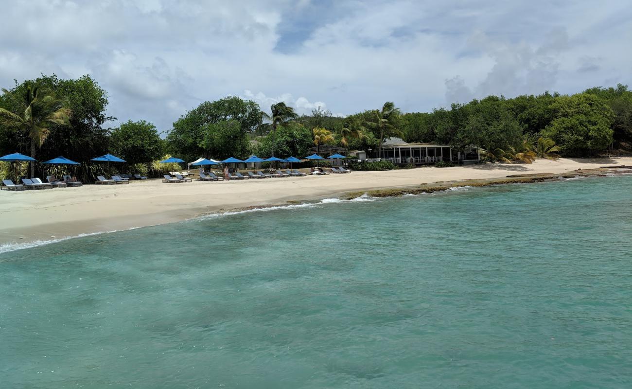 Photo of Cotton House beach with bright fine sand surface