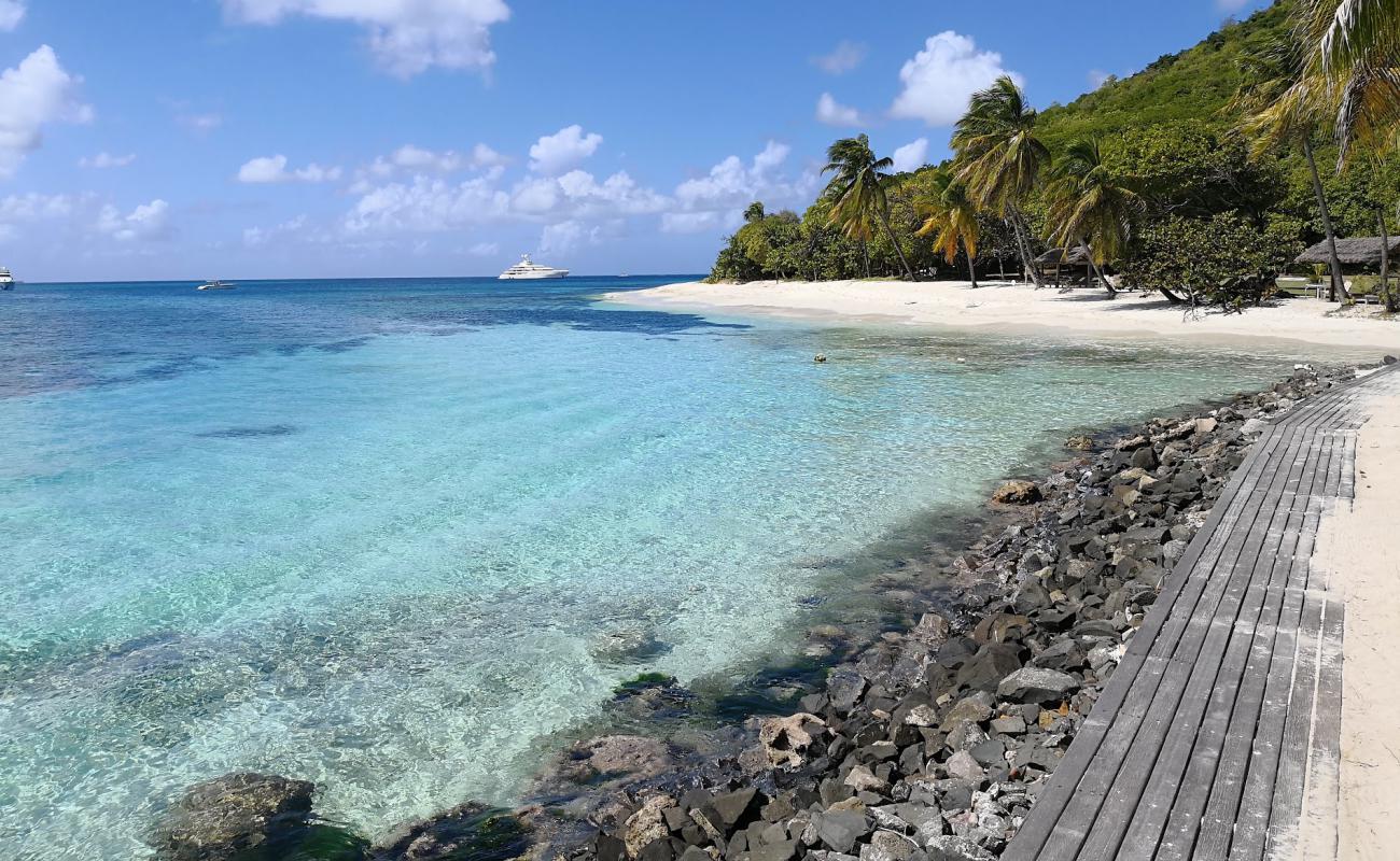 Photo of Petit Saint Vincent beach with white fine sand surface