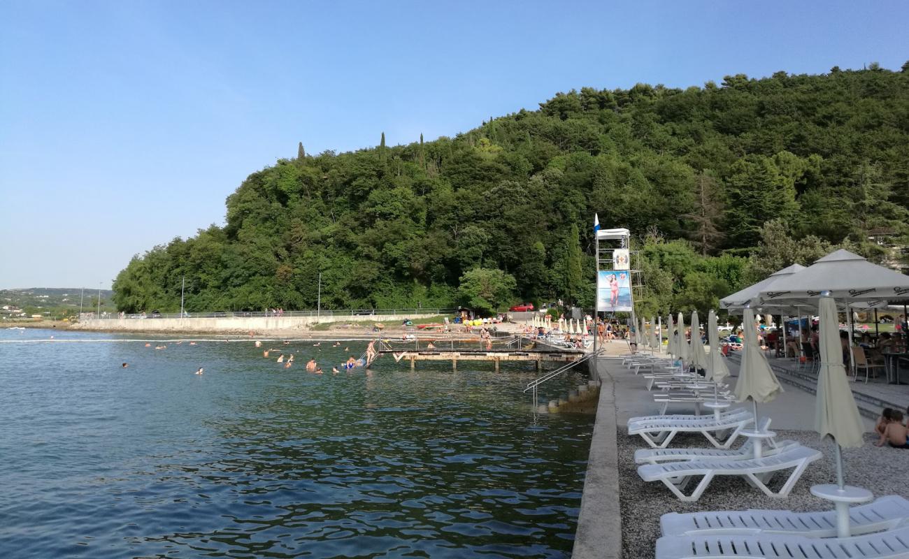 Photo of Salinera beach with concrete cover surface