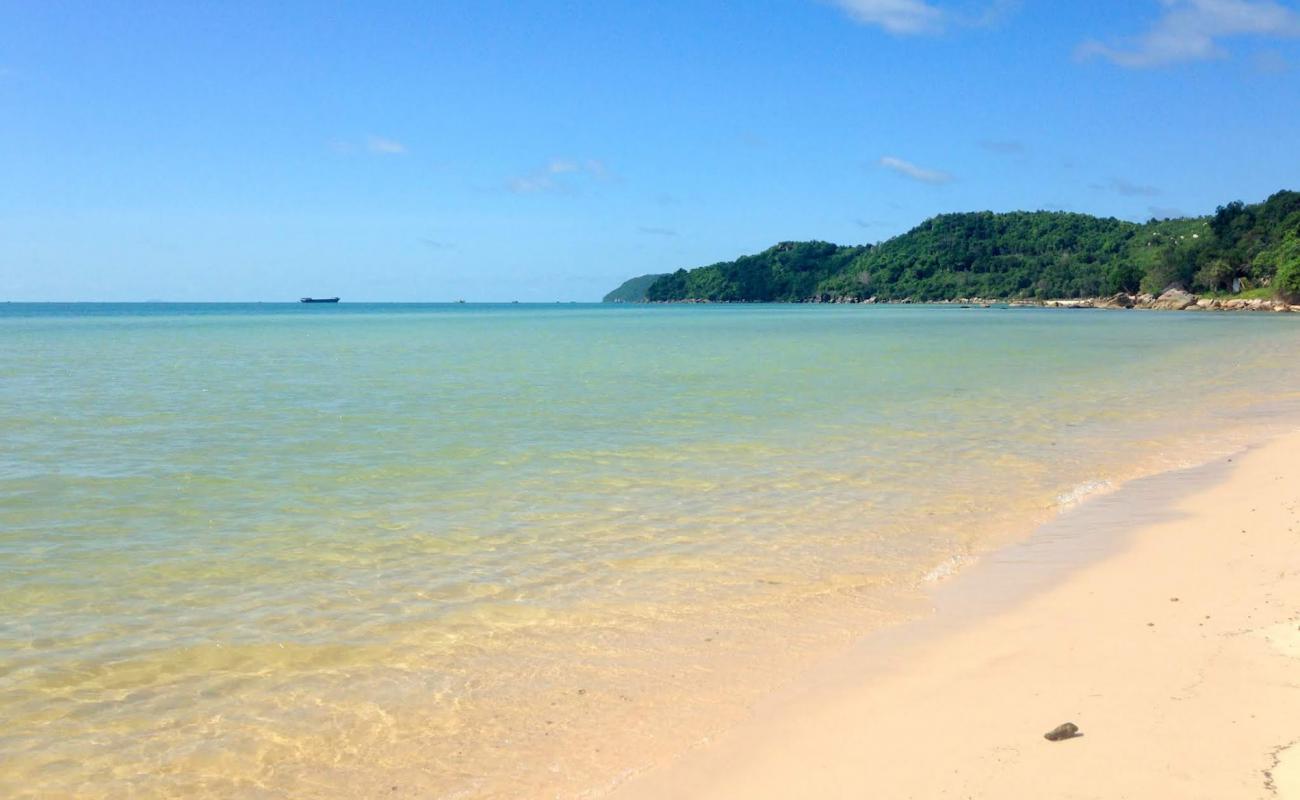 Photo of Middle beach with white sand surface