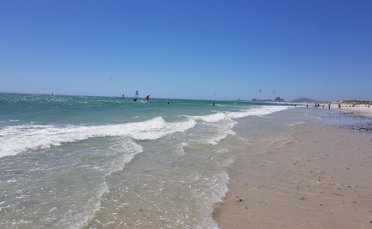 Photo of Sunset beach with bright sand surface