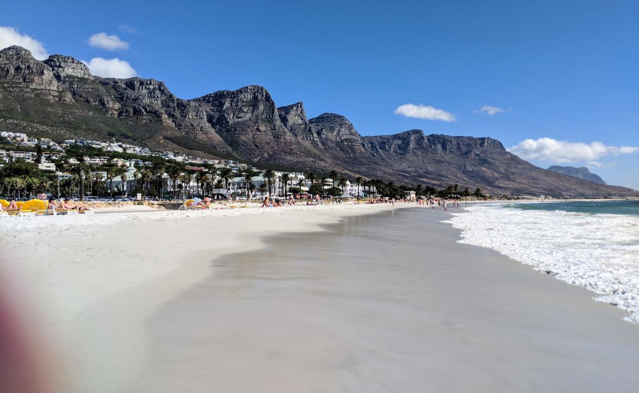 Photo of Camps Bay beach with bright fine sand surface