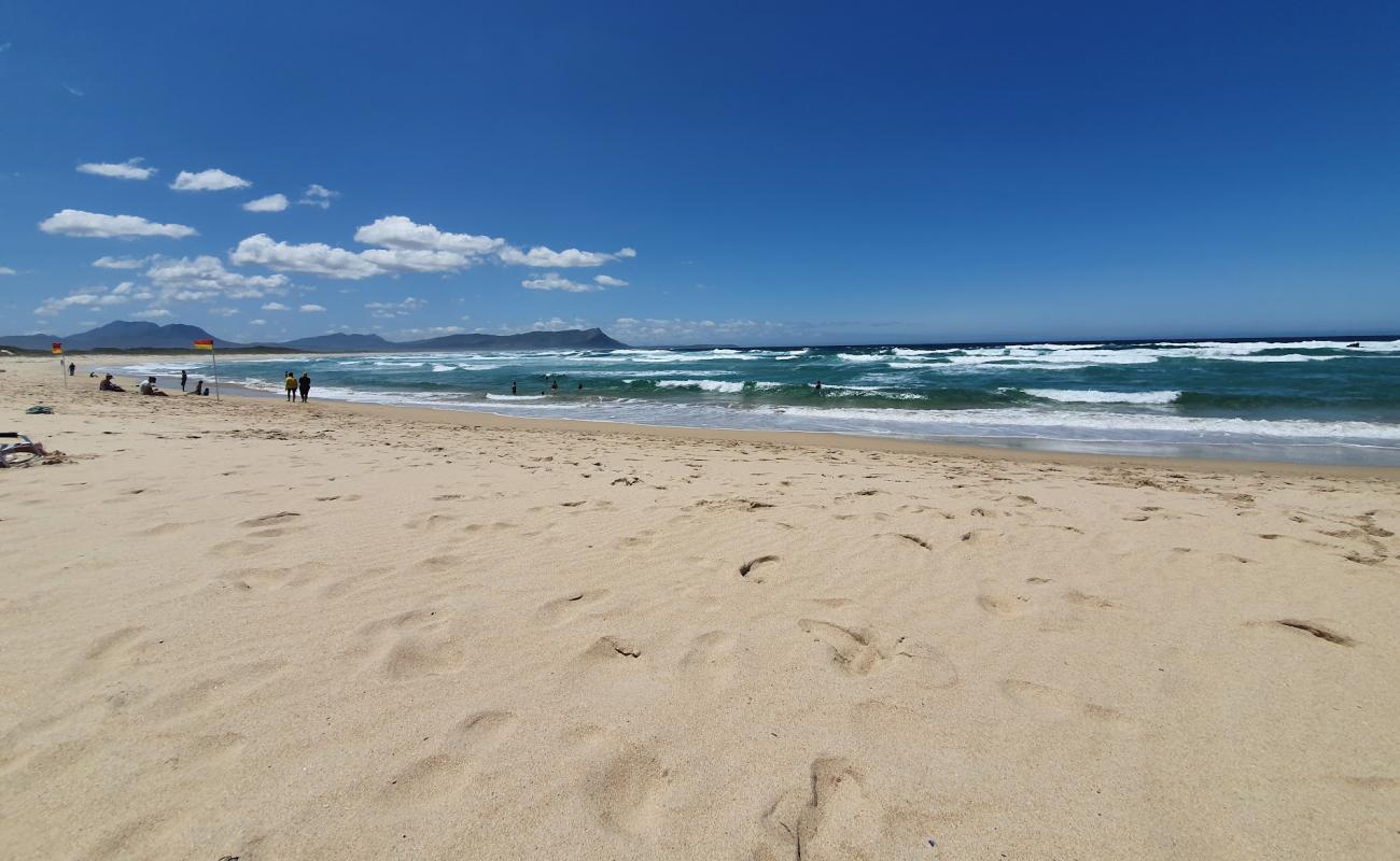 Photo of Kleinmond beach with bright fine sand surface