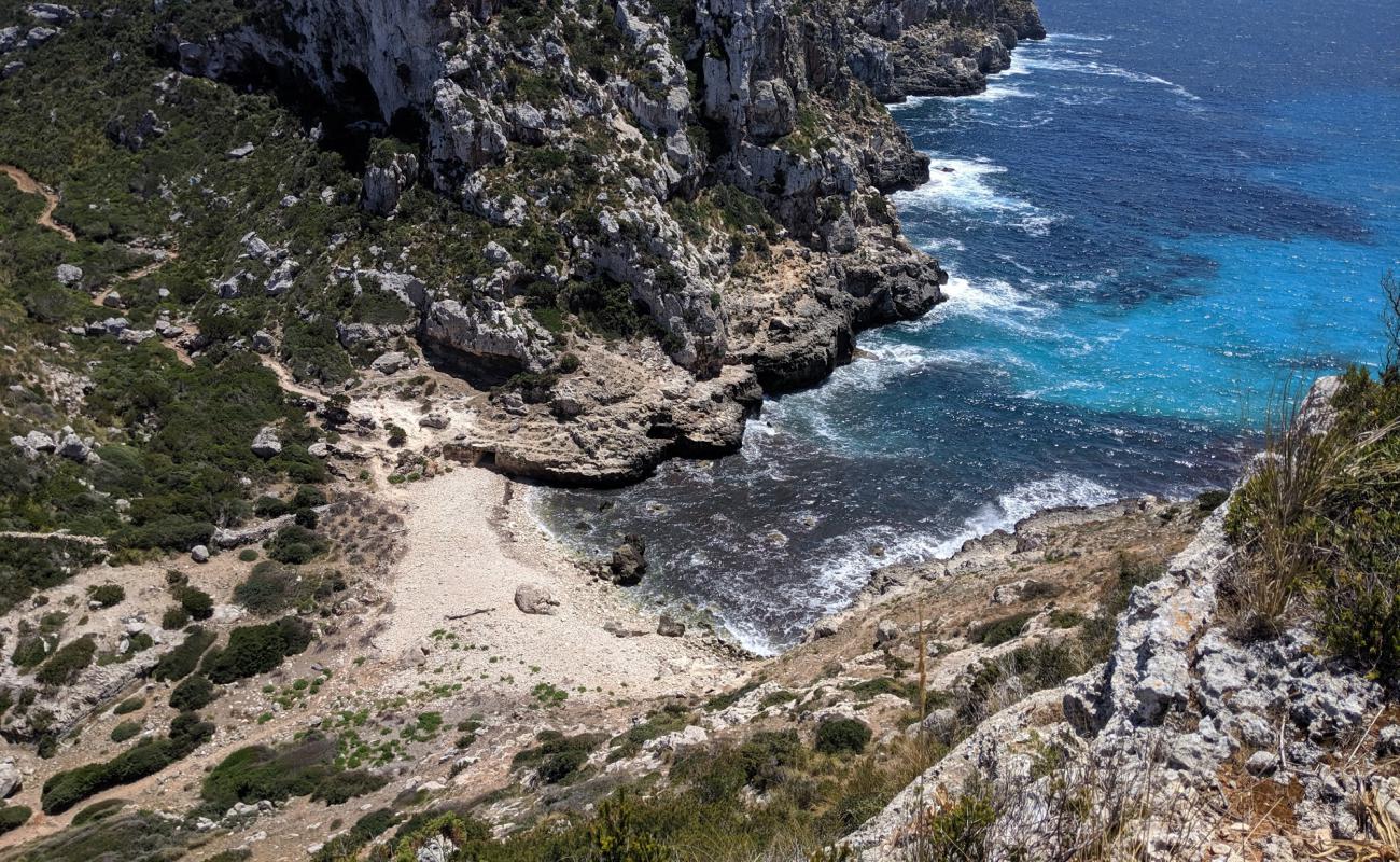 Photo of Cala de Ilucalari with rocks cover surface