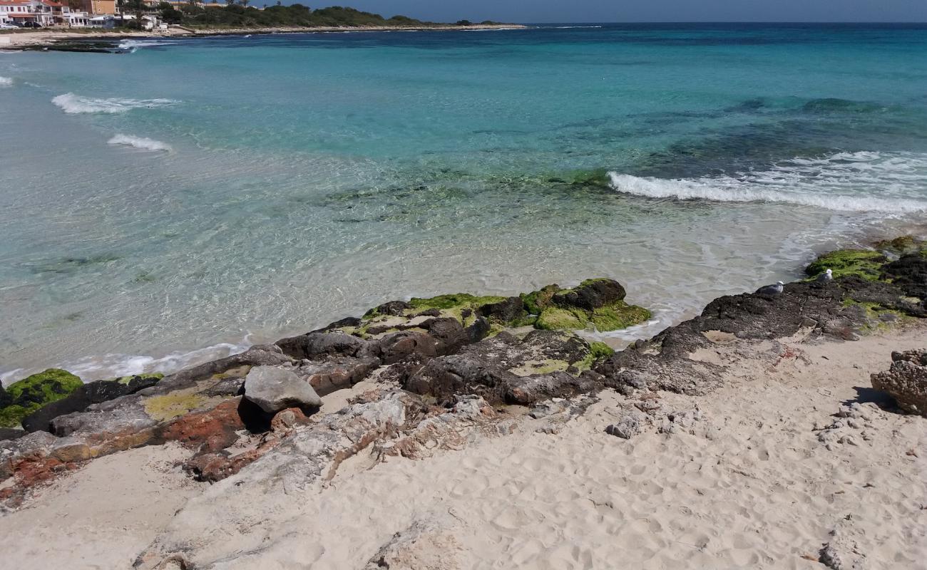 Photo of Punta Prima Beach with bright fine sand surface