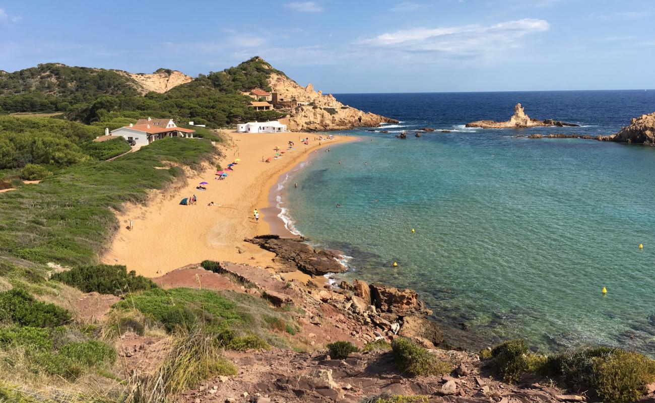 Photo of Cala Pregonda with brown sand surface