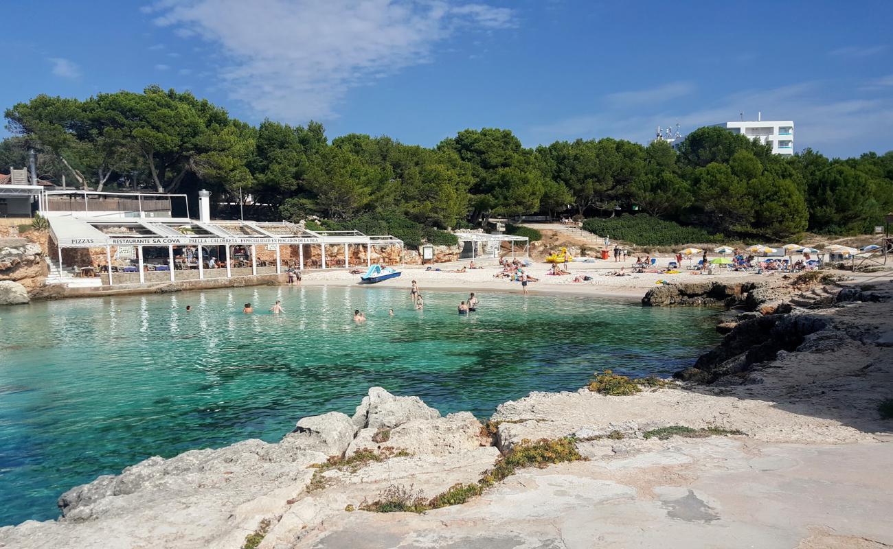 Photo of Playa Cala Blanca with bright fine sand surface