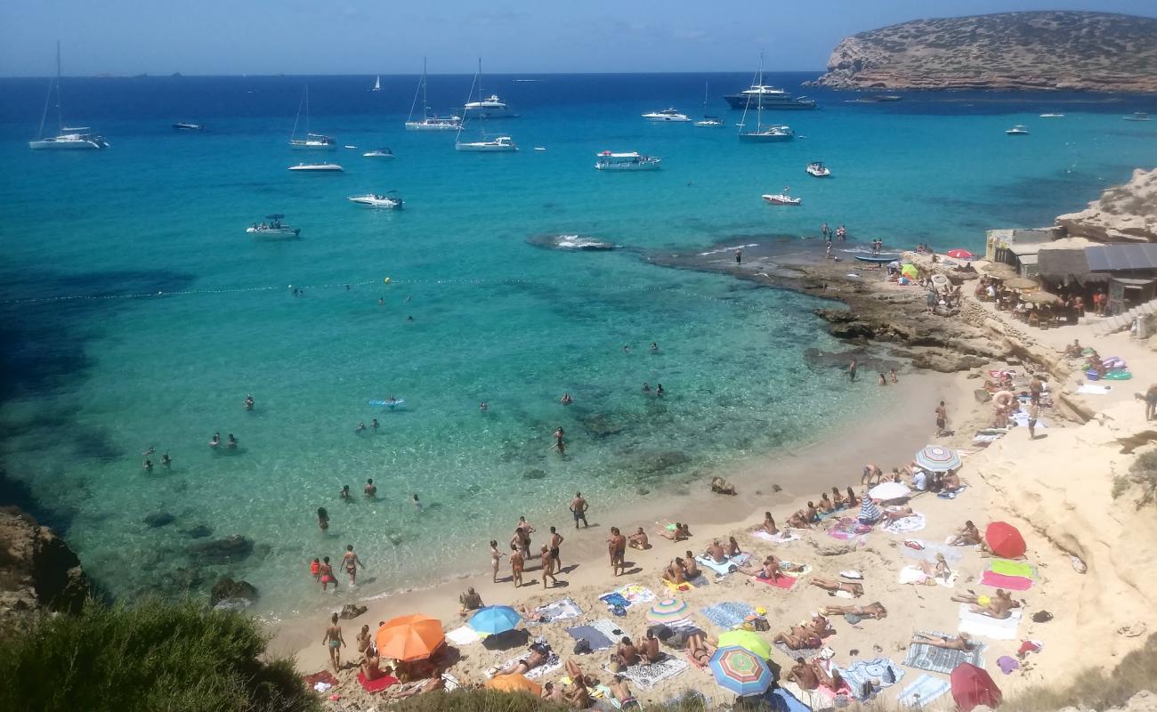 Photo of Playa Cala Conta with bright fine sand surface