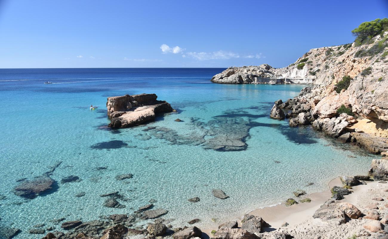 Photo of Cala Tarida pequena with bright fine sand surface