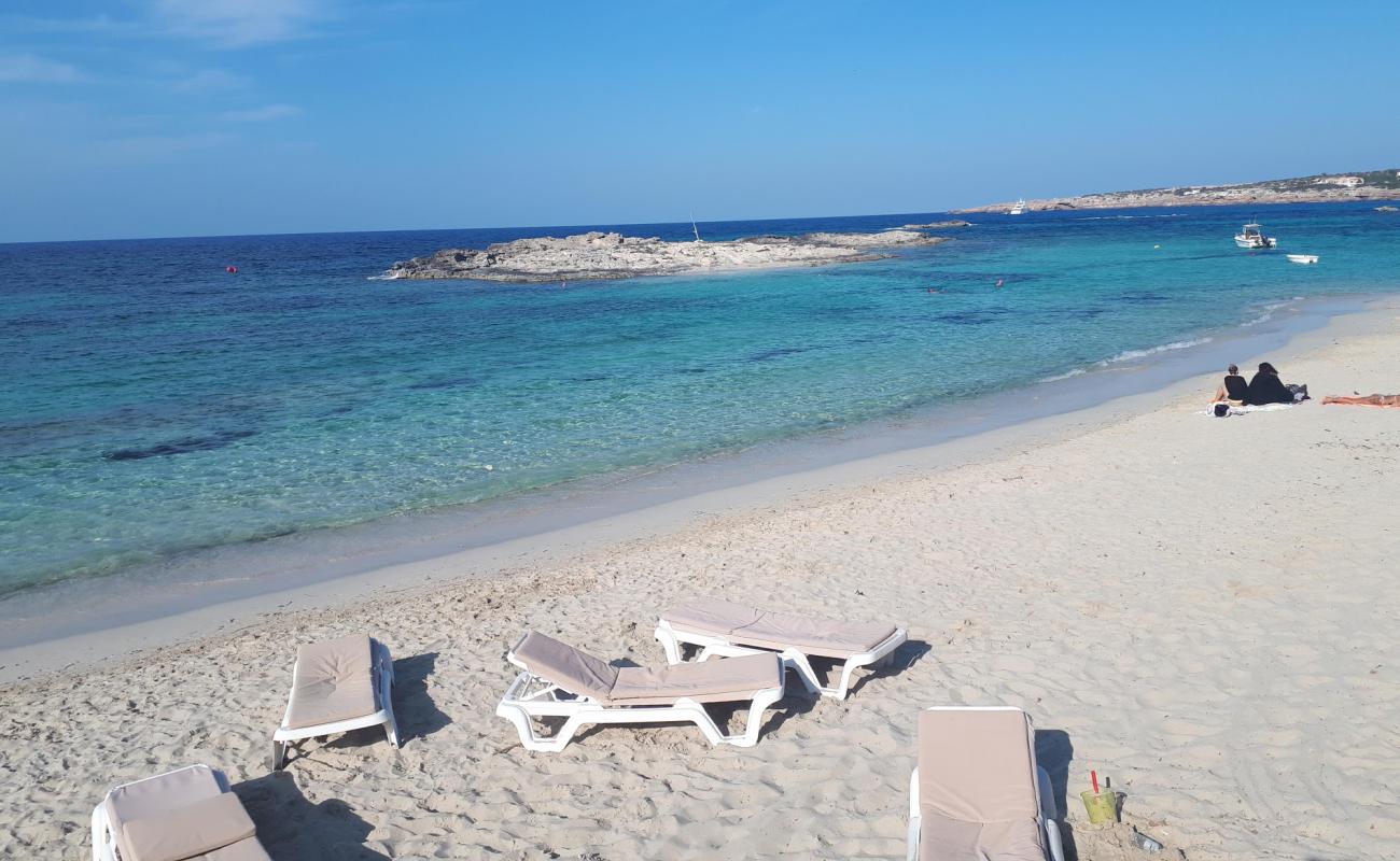 Photo of Platja Es Pujols with white fine sand surface