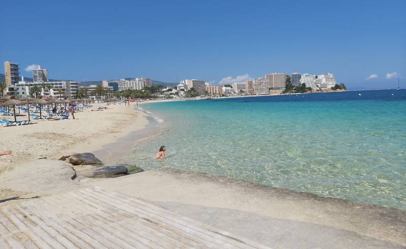 Photo of Magaluf Beach with bright fine sand surface