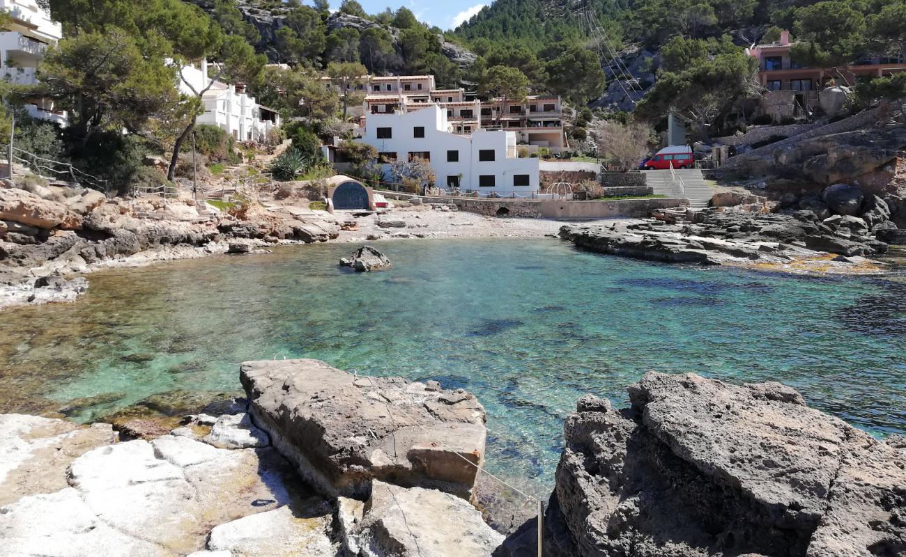 Photo of Playa Cala Conills with bright sand & rocks surface