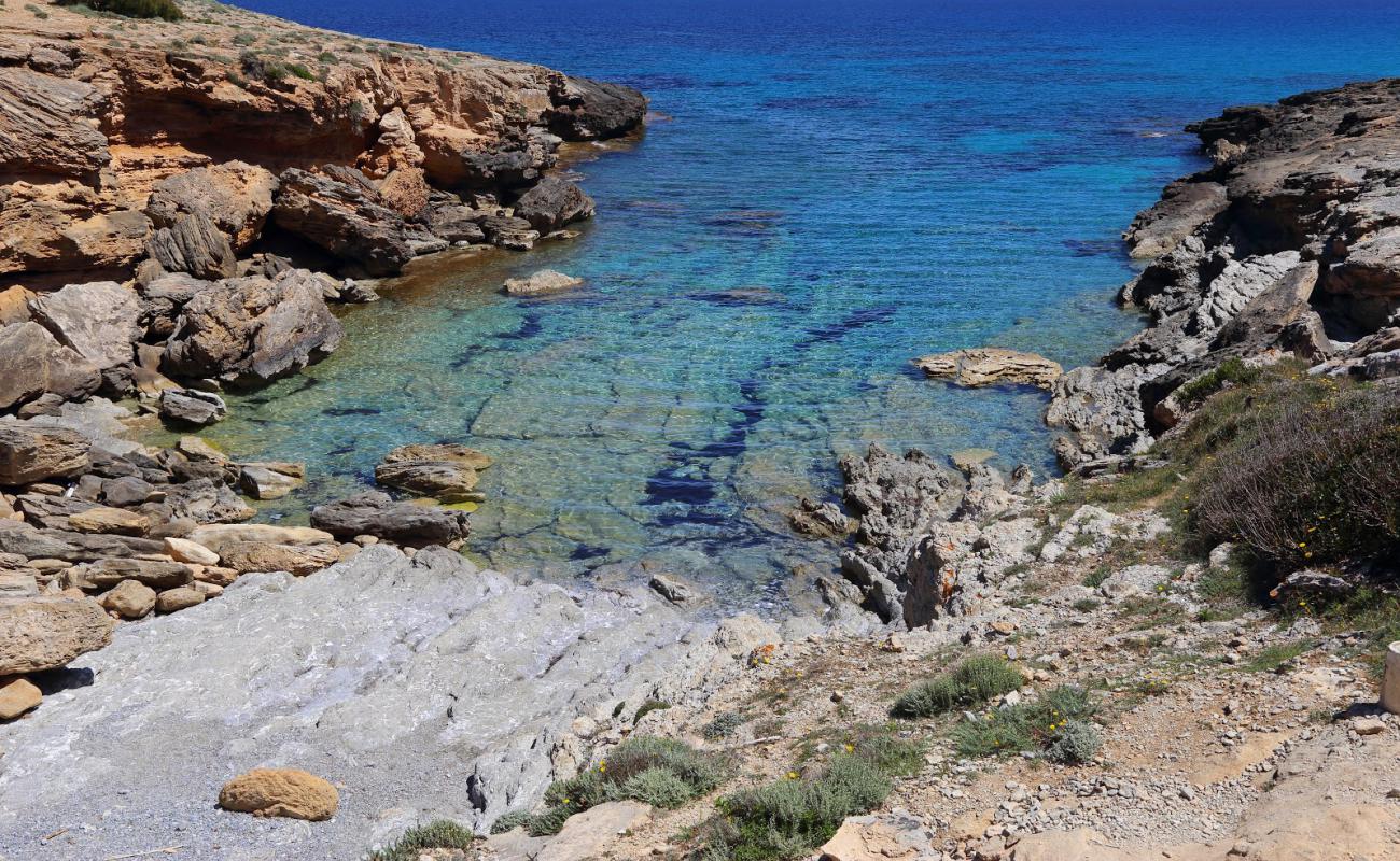 Photo of Cala Estreta with rocks cover surface