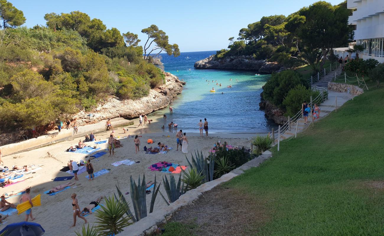 Photo of Cala De Egos with bright fine sand surface