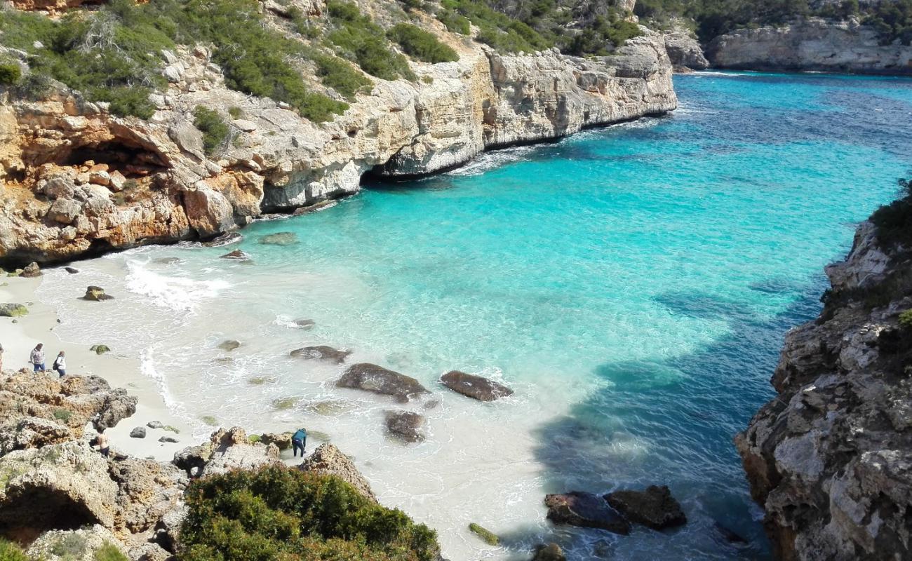 Photo of Calo del Moro beach with bright fine sand surface