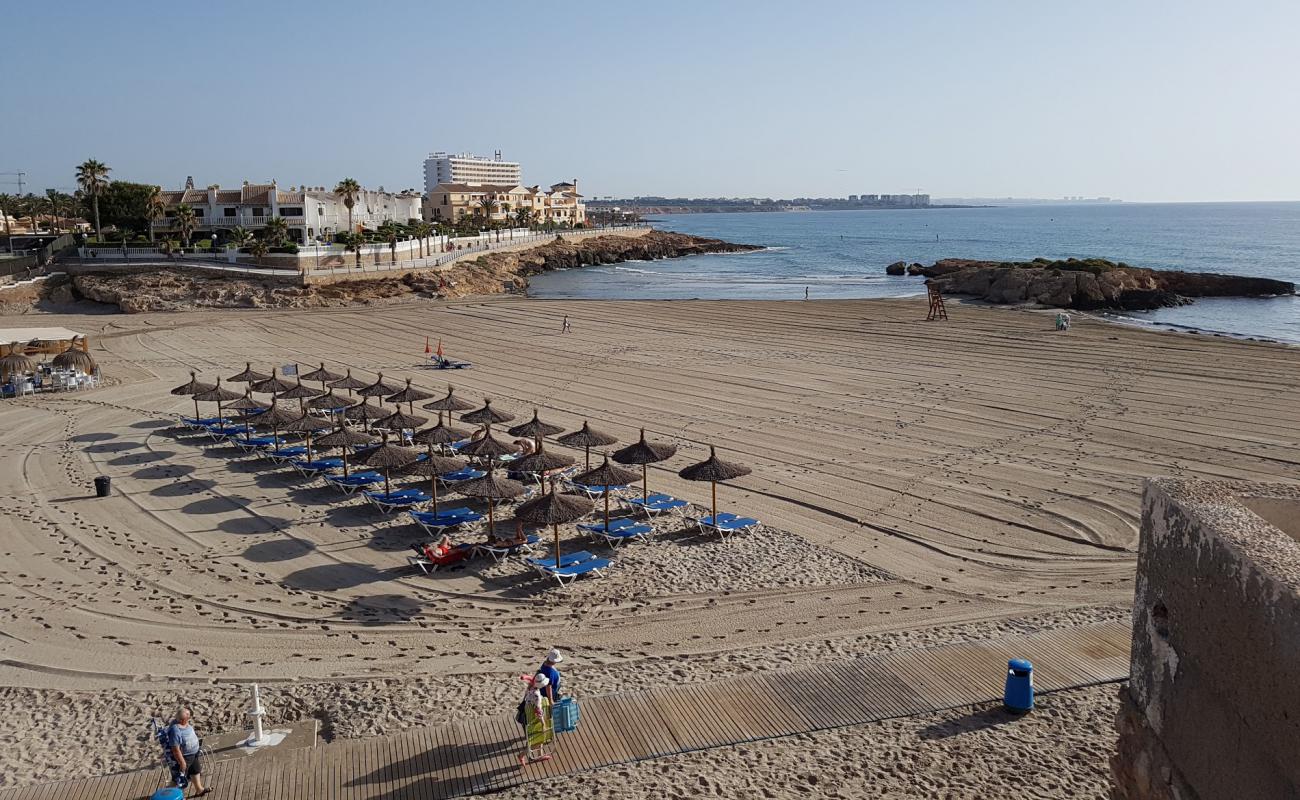 Photo of Playa Cala el Capitan with brown sand surface