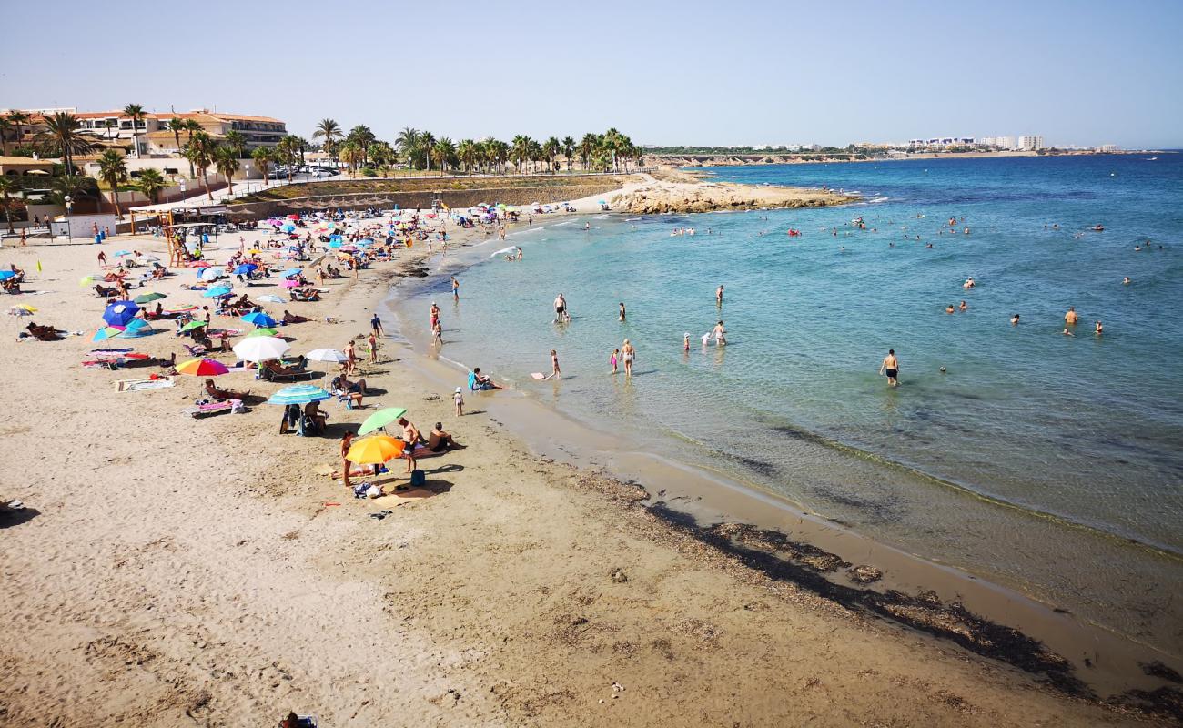 Photo of Flamenca Beach with brown sand surface