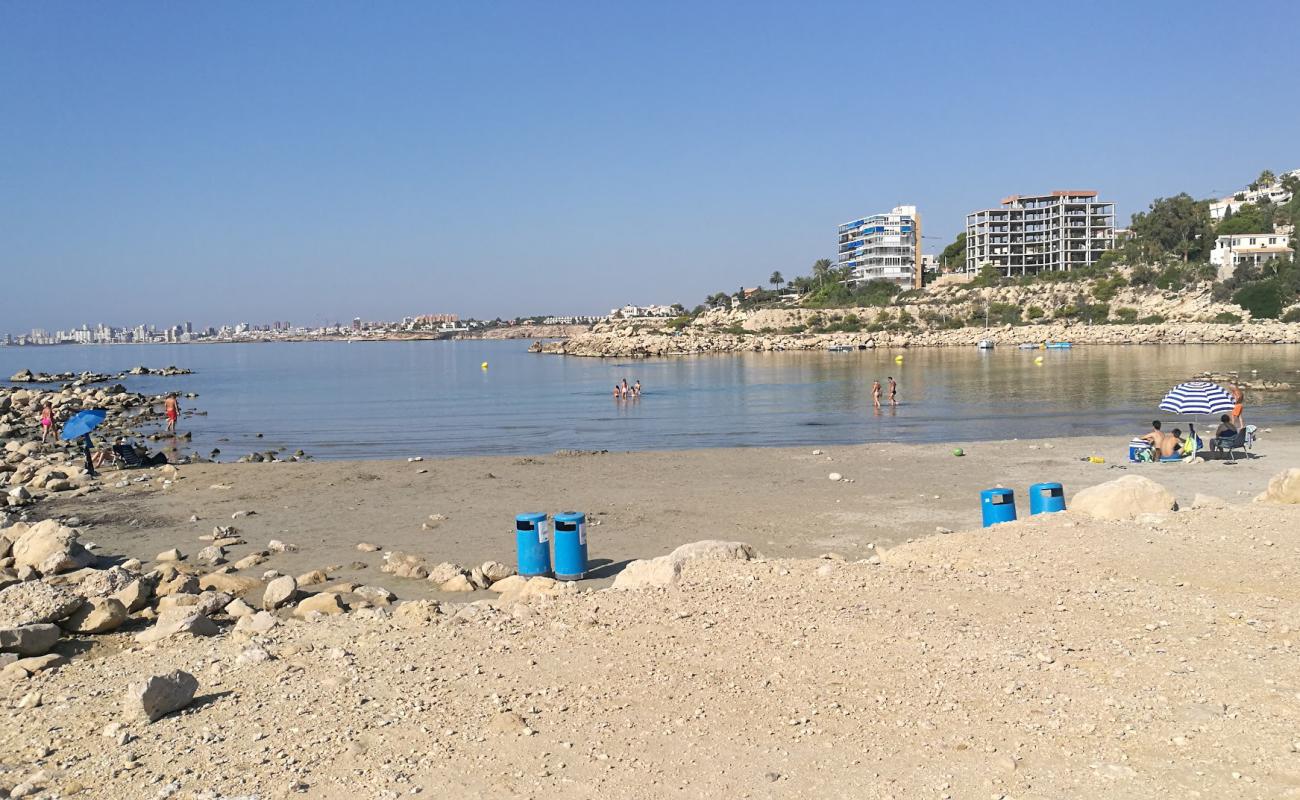 Photo of Cala del Morro Blanc with brown sand surface