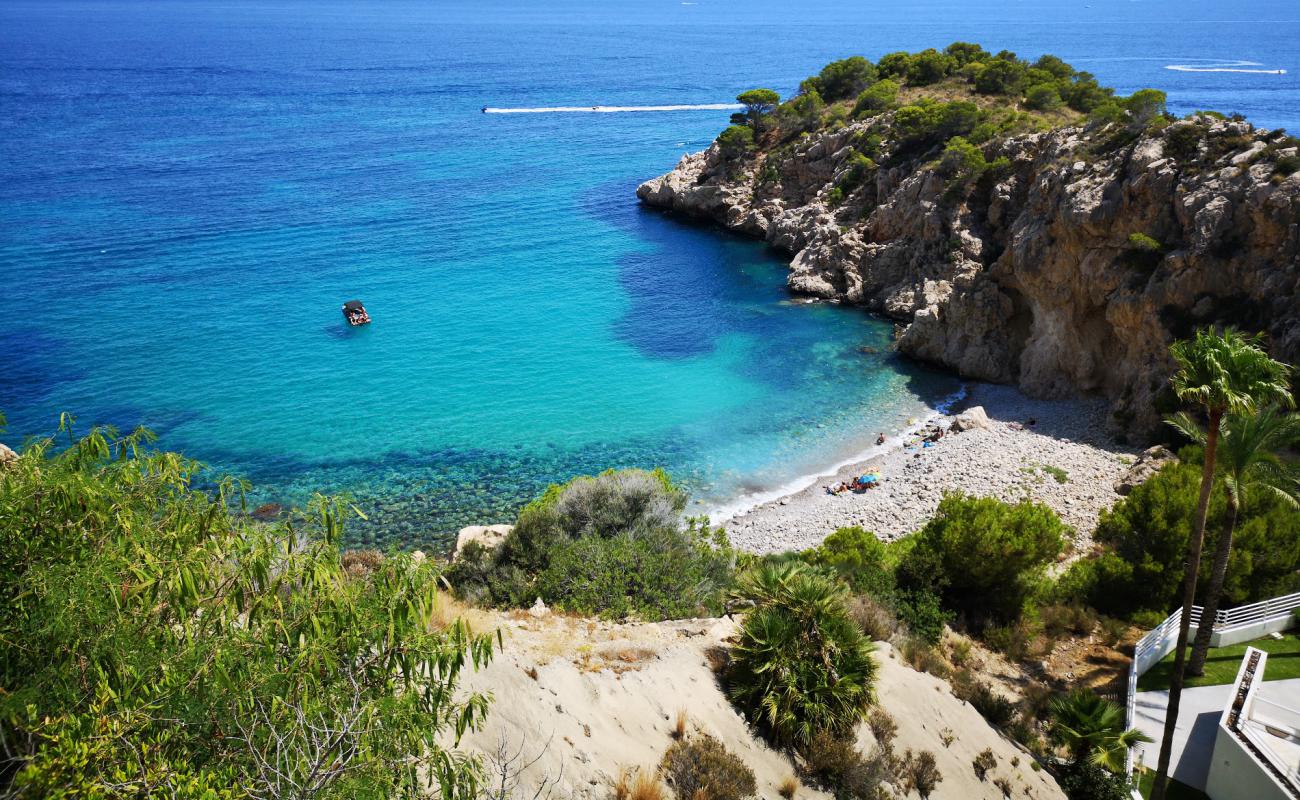 Photo of Cala Mascarat with light pebble surface