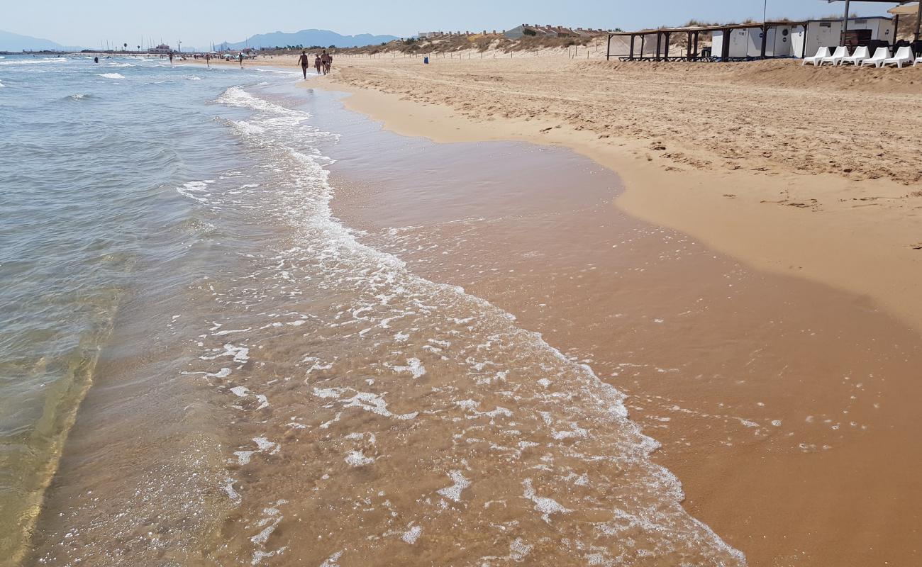 Photo of Platja Aigua Blanca with brown sand surface