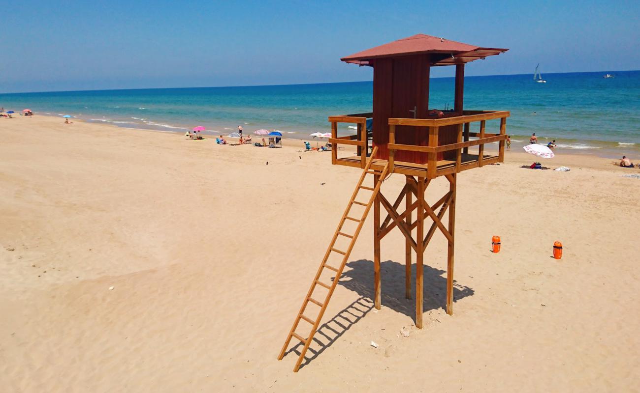 Photo of Cullera Naturista with brown sand surface