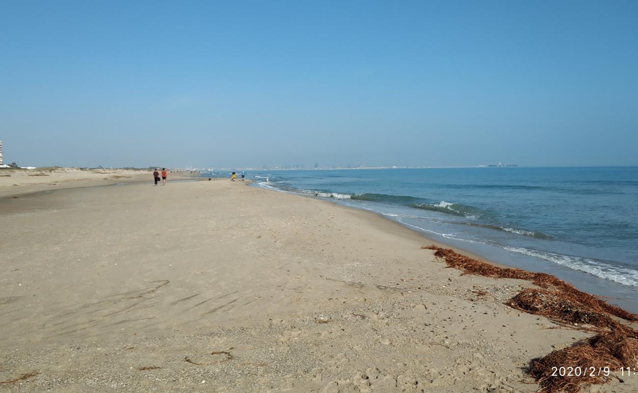 Photo of Platja la Garrofera with brown sand surface