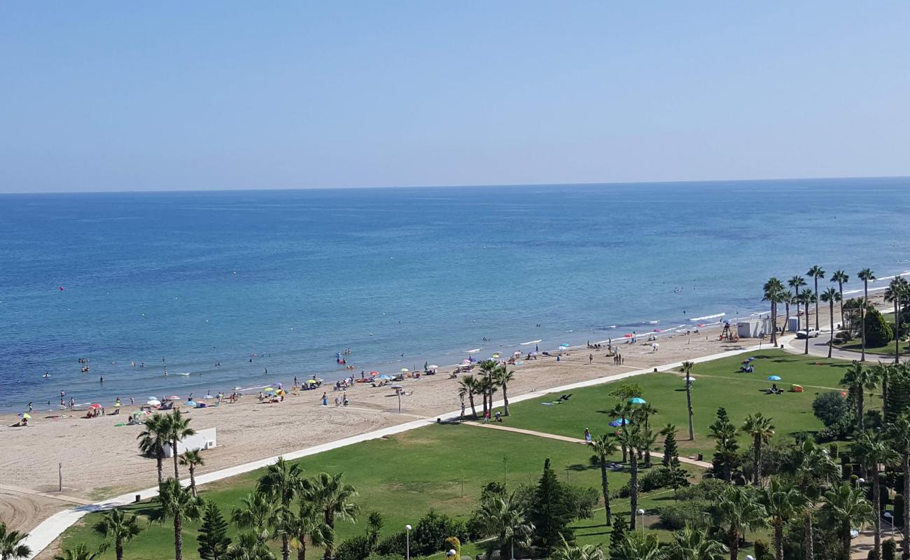 Photo of Playa de les Amplaries with brown sand surface