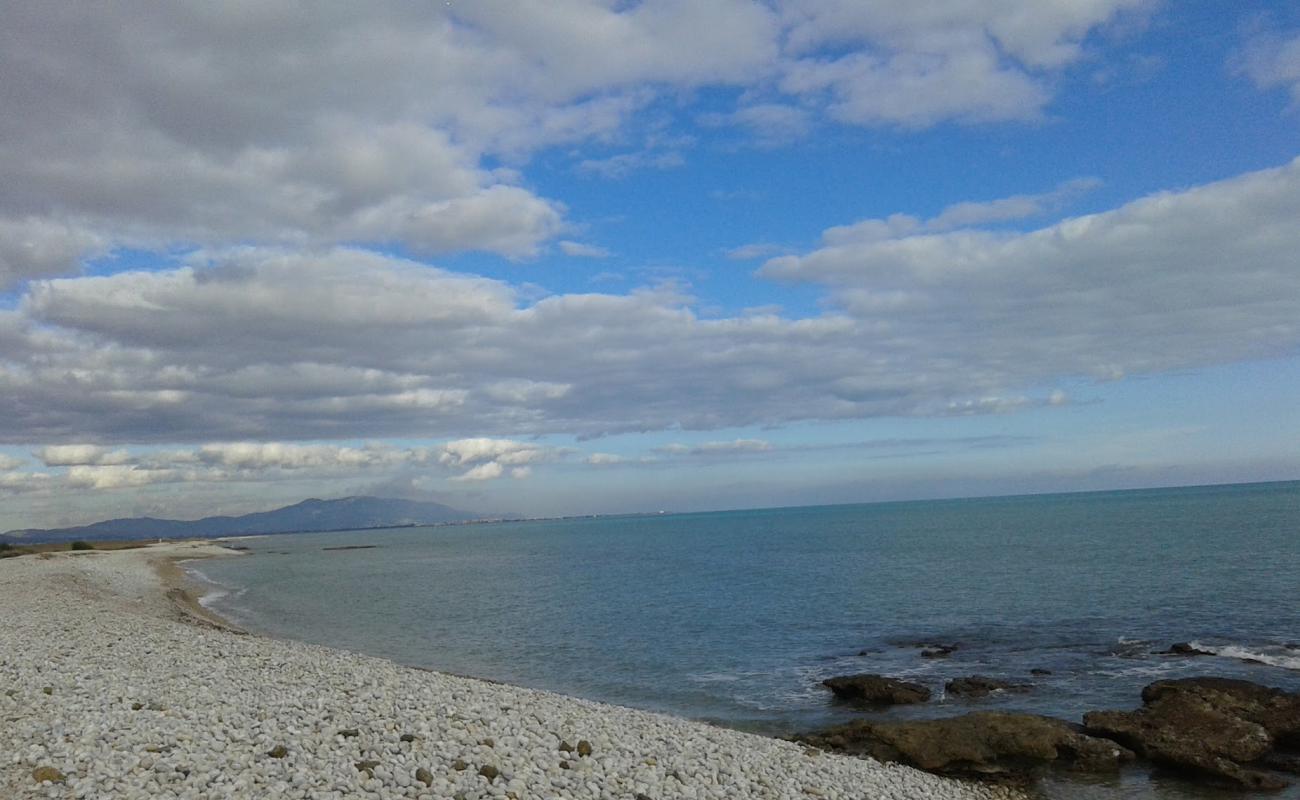 Photo of Playa Torre la Sal with gray pebble surface