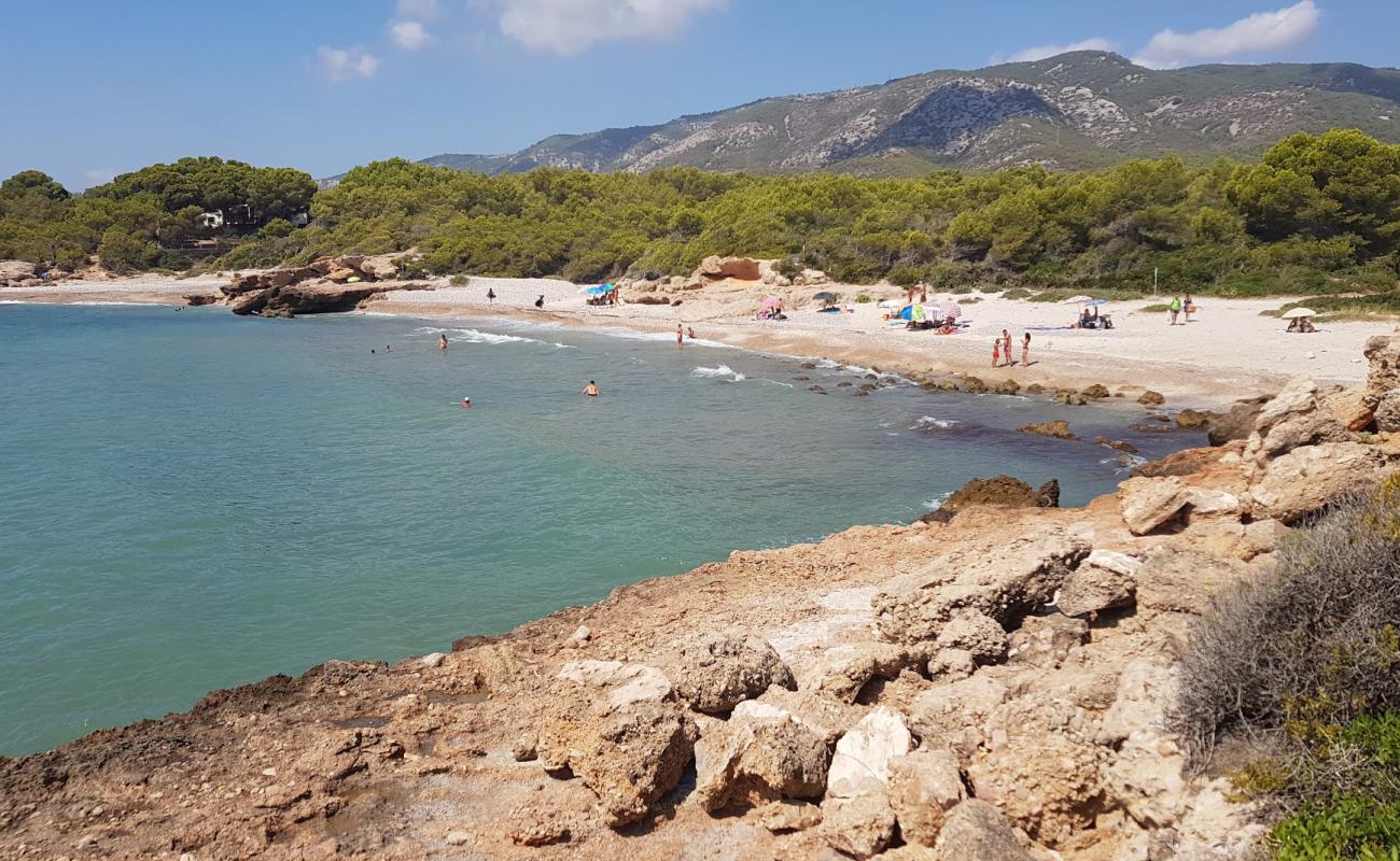 Photo of Cala Argilaga with light sand &  pebble surface