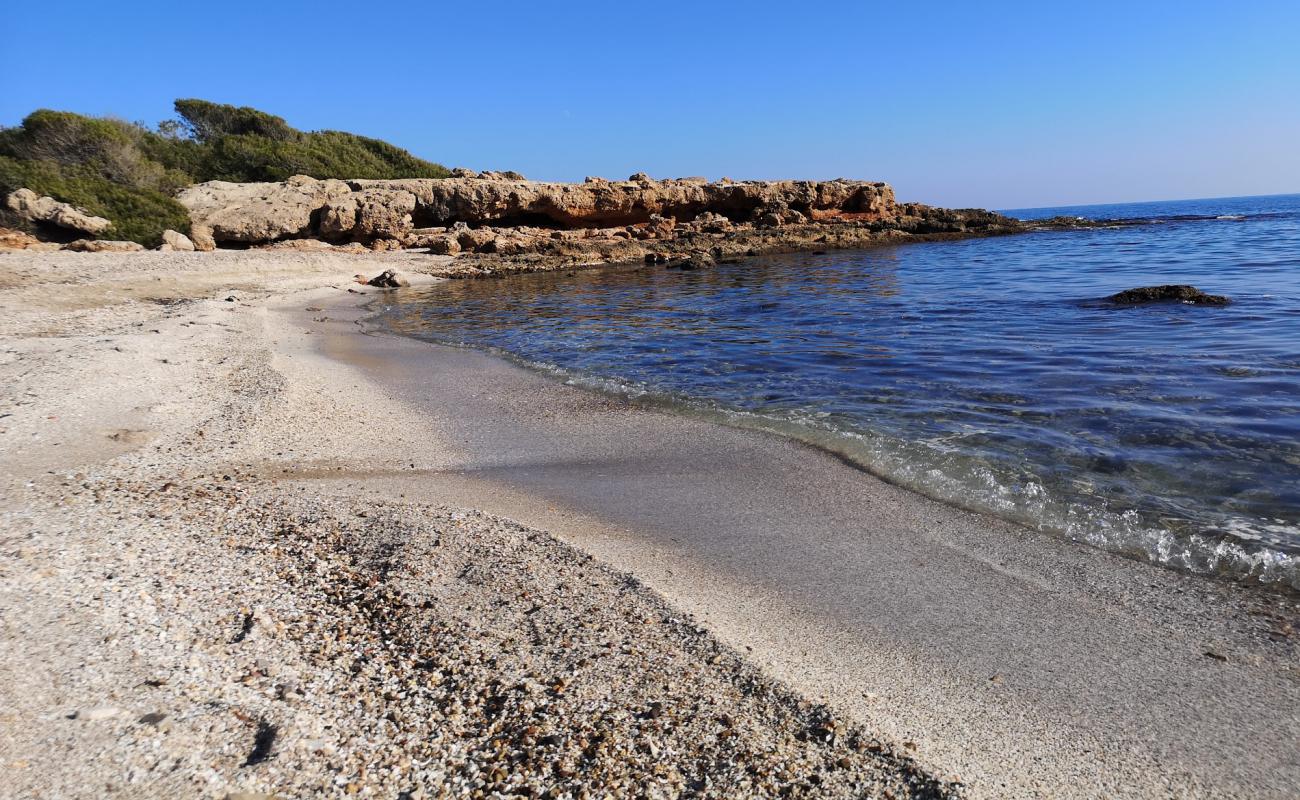 Photo of Platja d'Irta with gray sand &  pebble surface