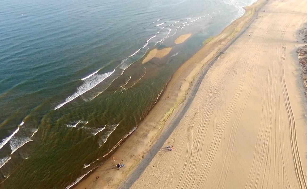 Photo of Playa de los Haraganes with bright sand surface