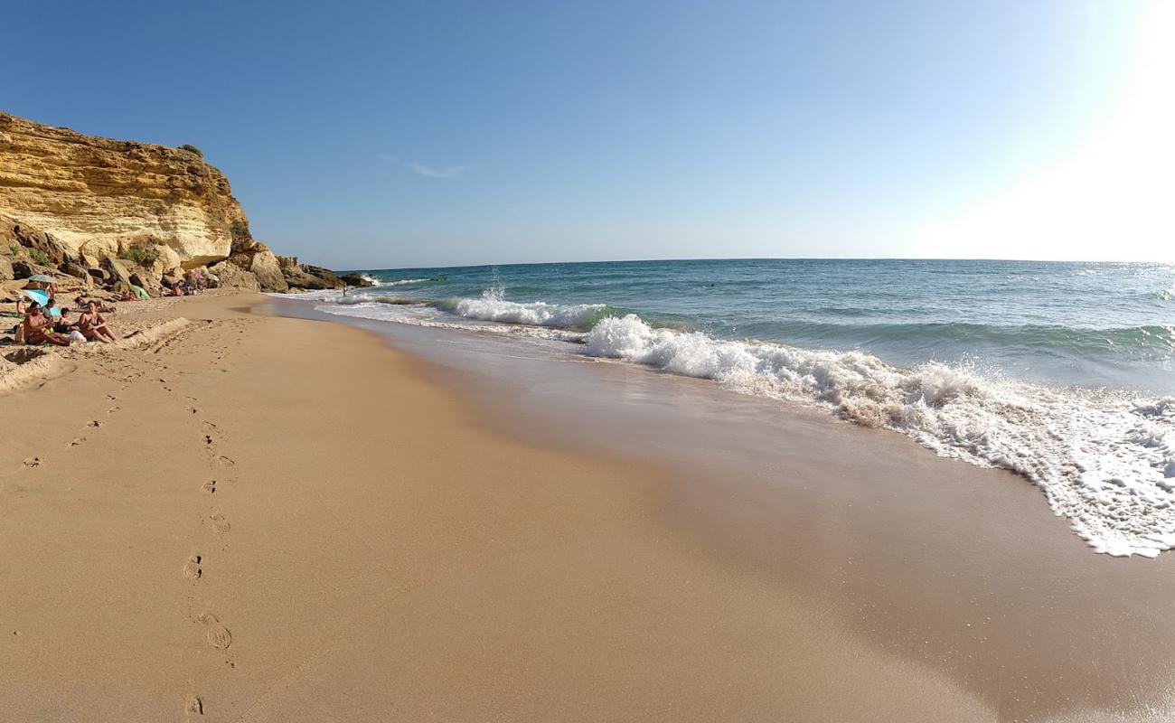 Photo of Cala del tio Juan Medina with bright sand surface