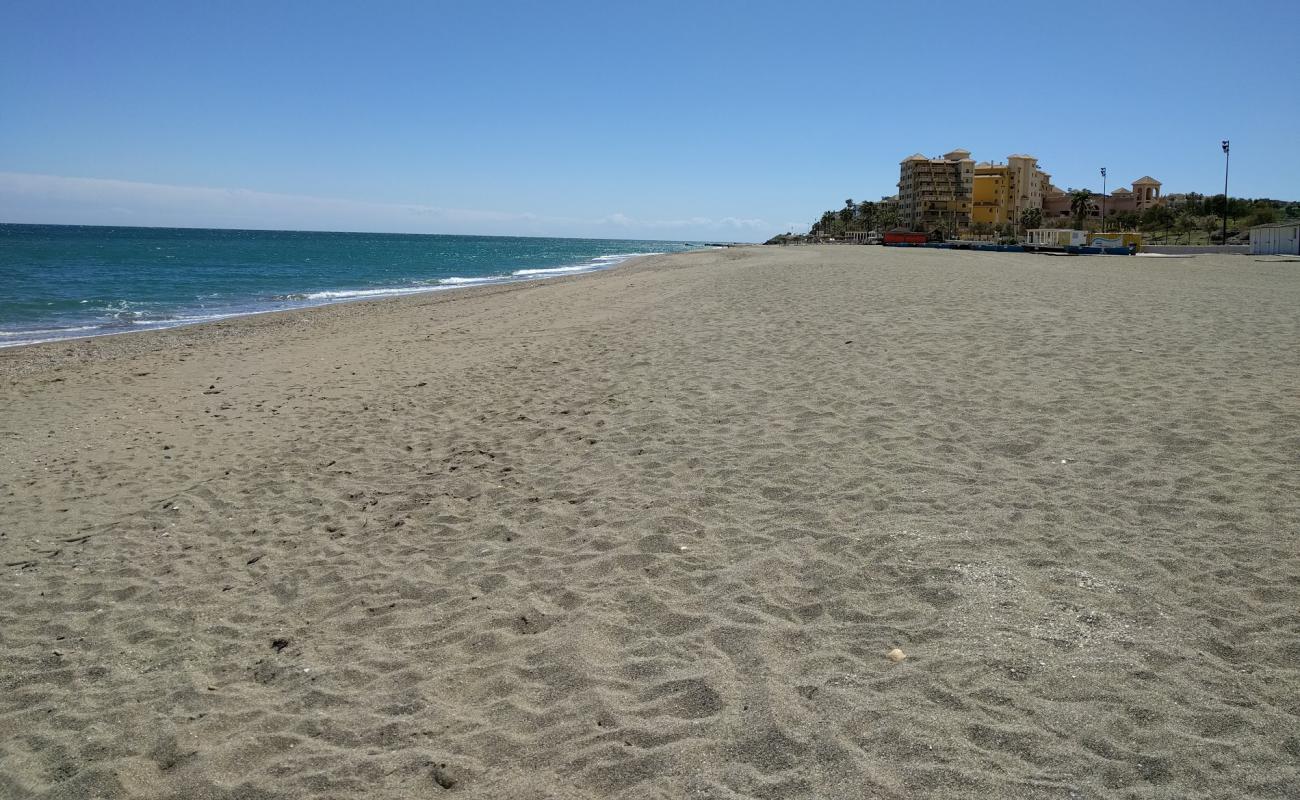 Photo of Playa del Castillo Sohail with gray sand surface