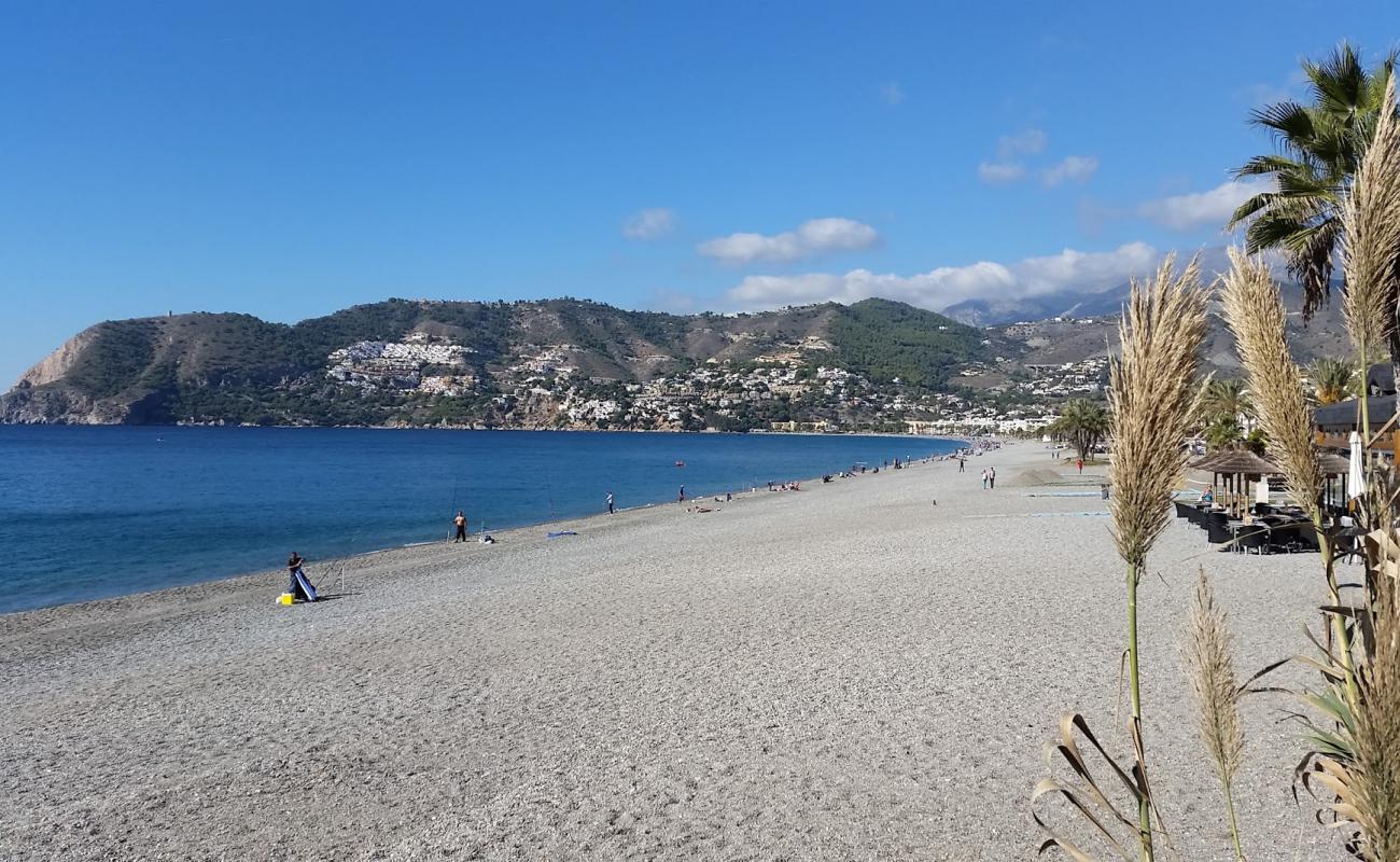 Photo of Herradura Beach with gray fine pebble surface