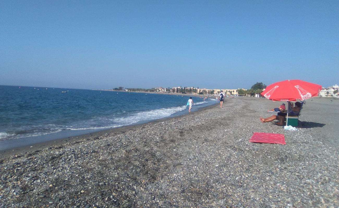 Photo of Motril Beach (Granada Beach) with gray shell sand surface