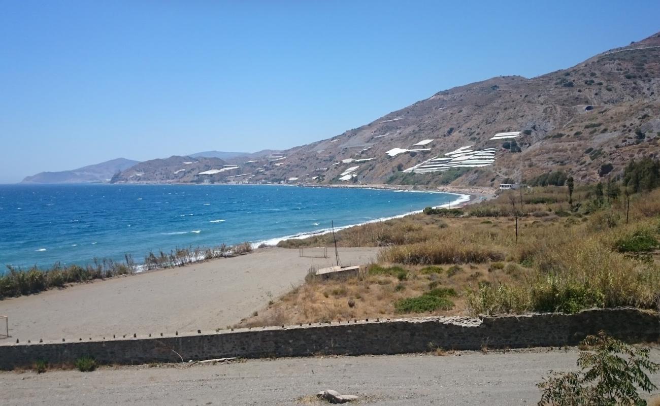 Photo of Playa de Melicena with gray sand &  pebble surface