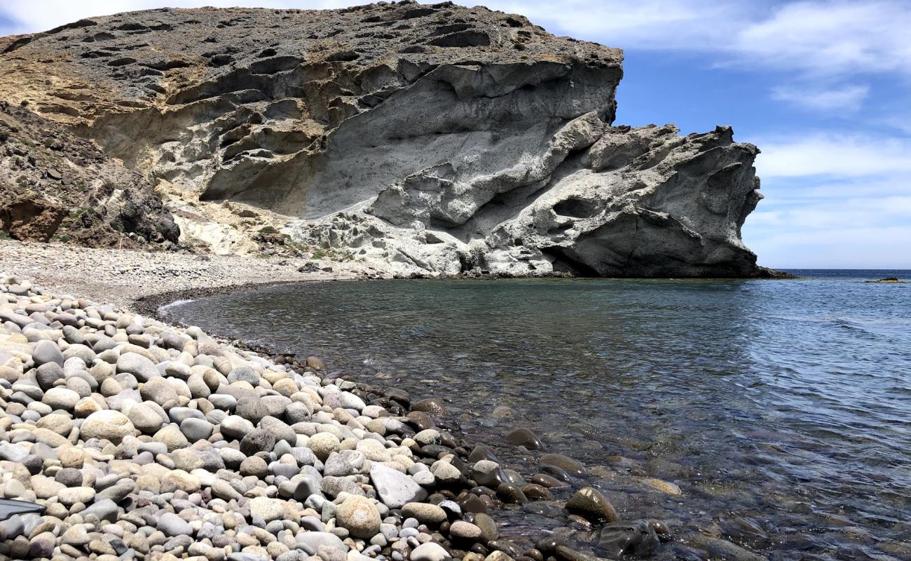 Photo of Cala Grande de los Escullos with gray pebble surface