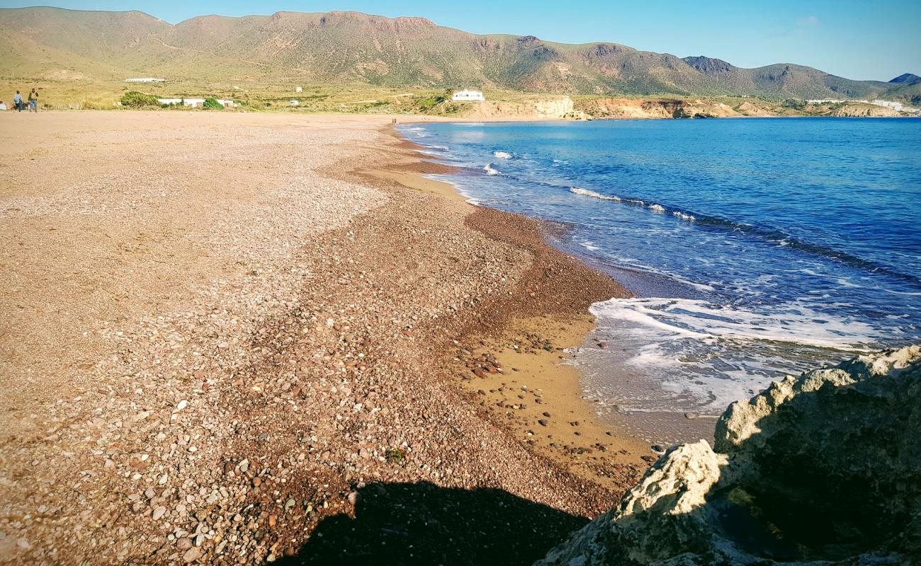 Photo of Playa Los Escullos with gray shell sand surface