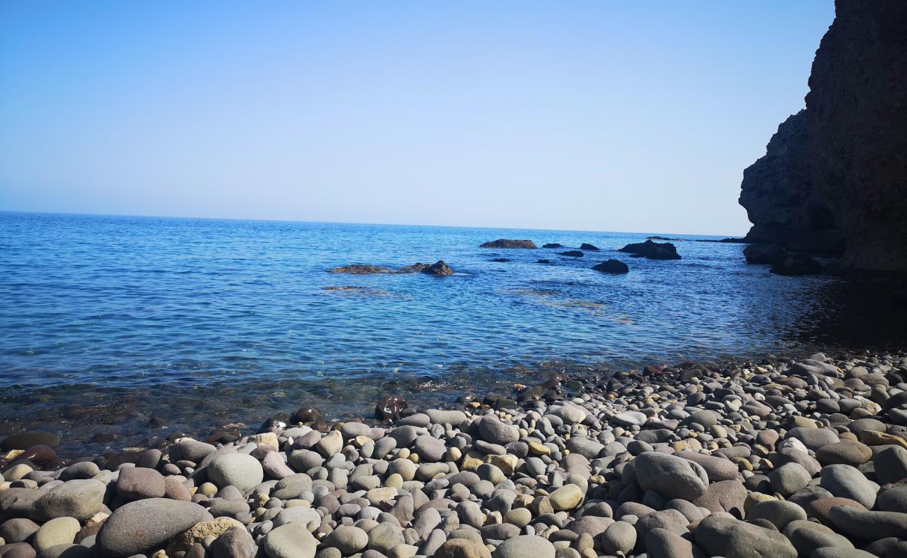 Photo of Cala los Mendrugos with gray pebble surface