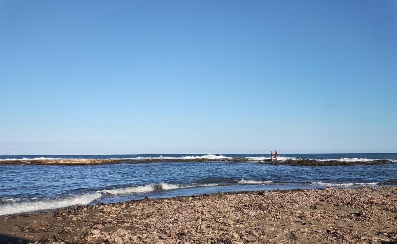 Photo of Cala de las Pulgas with gray fine pebble surface