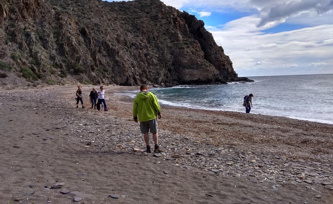 Photo of Cala Honda with gray sand &  pebble surface