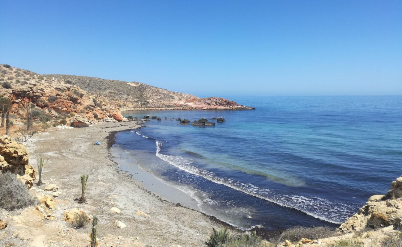 Photo of Cala Leno with gray sand surface