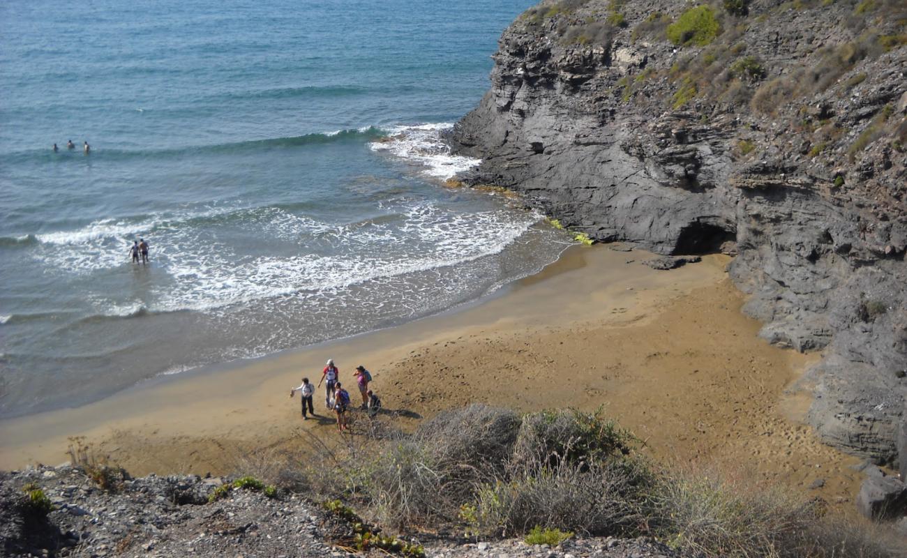 Photo of Cala Golera with brown sand surface