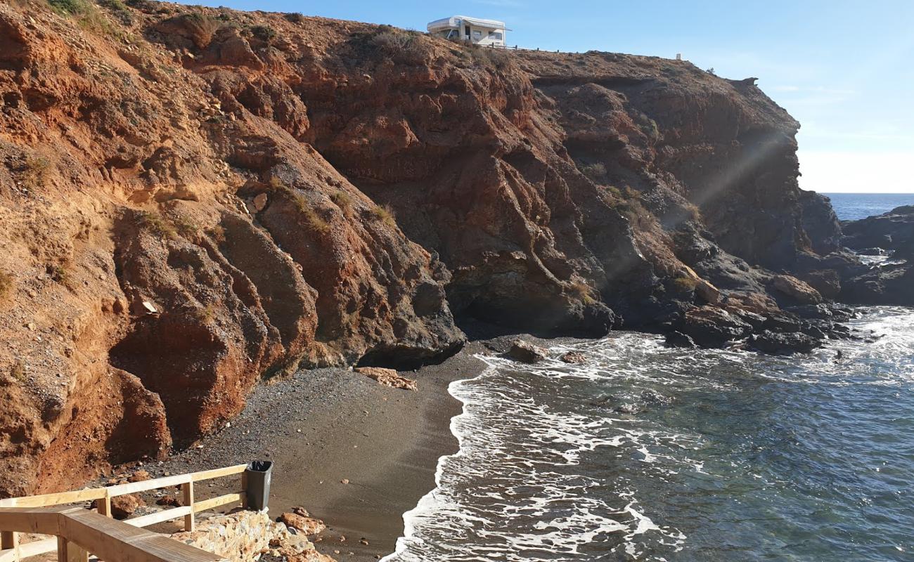 Photo of Cala Roja with gray shell sand surface