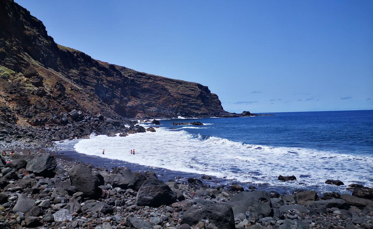 Photo of Playa de Callejoncito II with white sand &  rocks surface